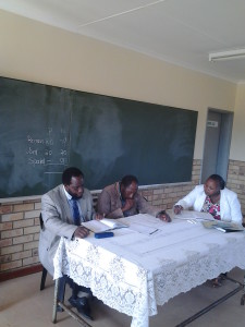 Efefe parents meeting- LtoR Efefe Primary School Principal Mr Mwelase, Chief Zulu and SGB miss Mncube